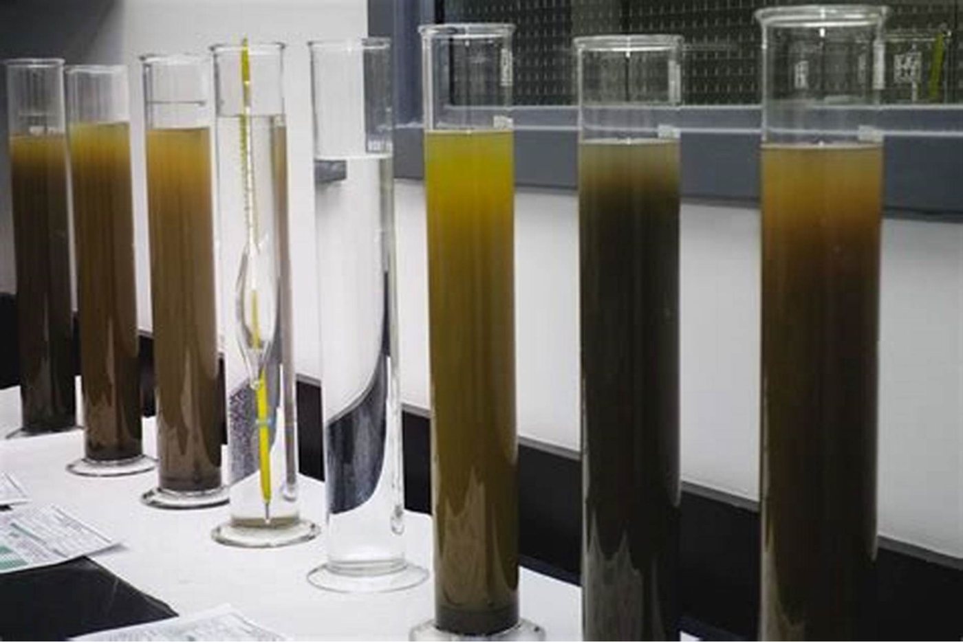 Jar testing across treatment stages shows the change in water clarity.
